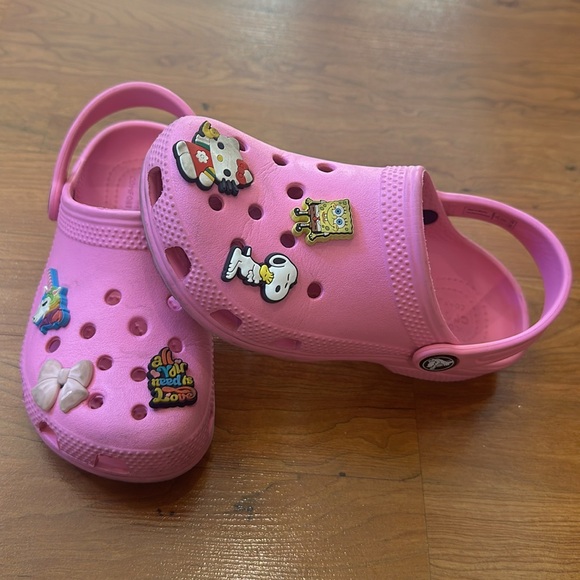 Preowned gently used Toddler girl size 12 crocs with removable charms. - Picture 6 of 7